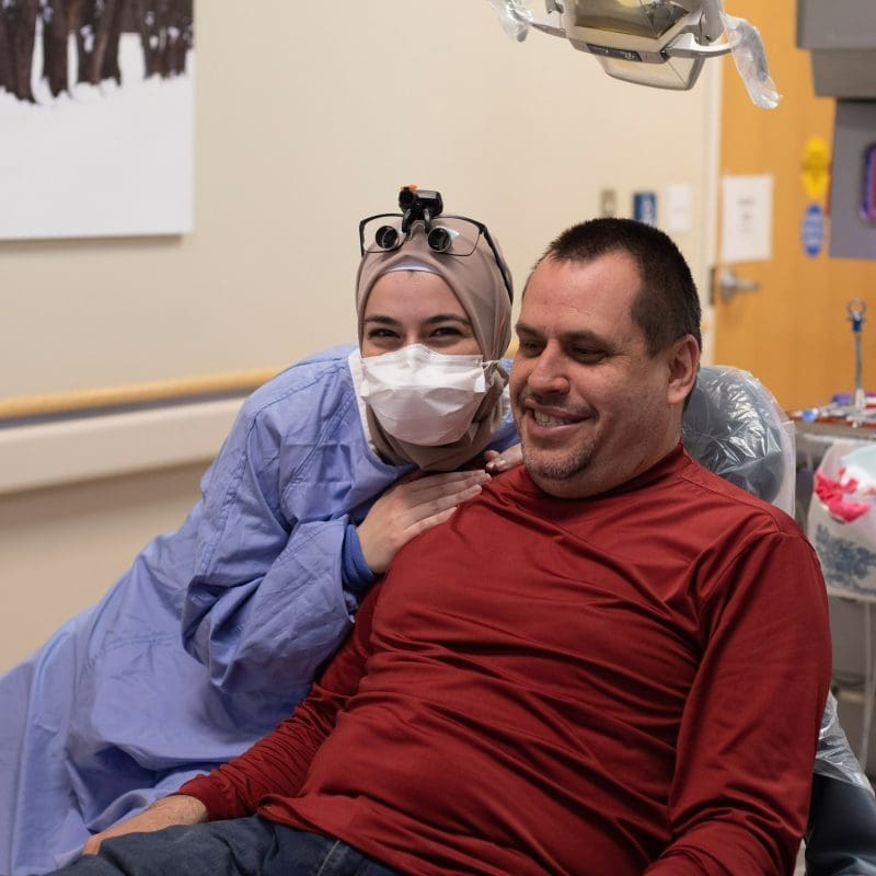 Special needs patient receiving sensory-friendly dental care.